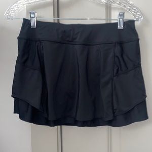 small black Athleta tennis skirt